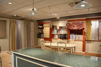 Kitchen curtain and shade displays in the Ambiance showroom