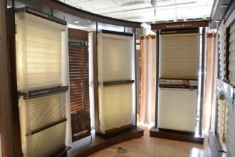 A variety of Hunter Douglas window shades on display in showroom