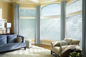 Silhouette Easy Rise window shades in a sunny living room